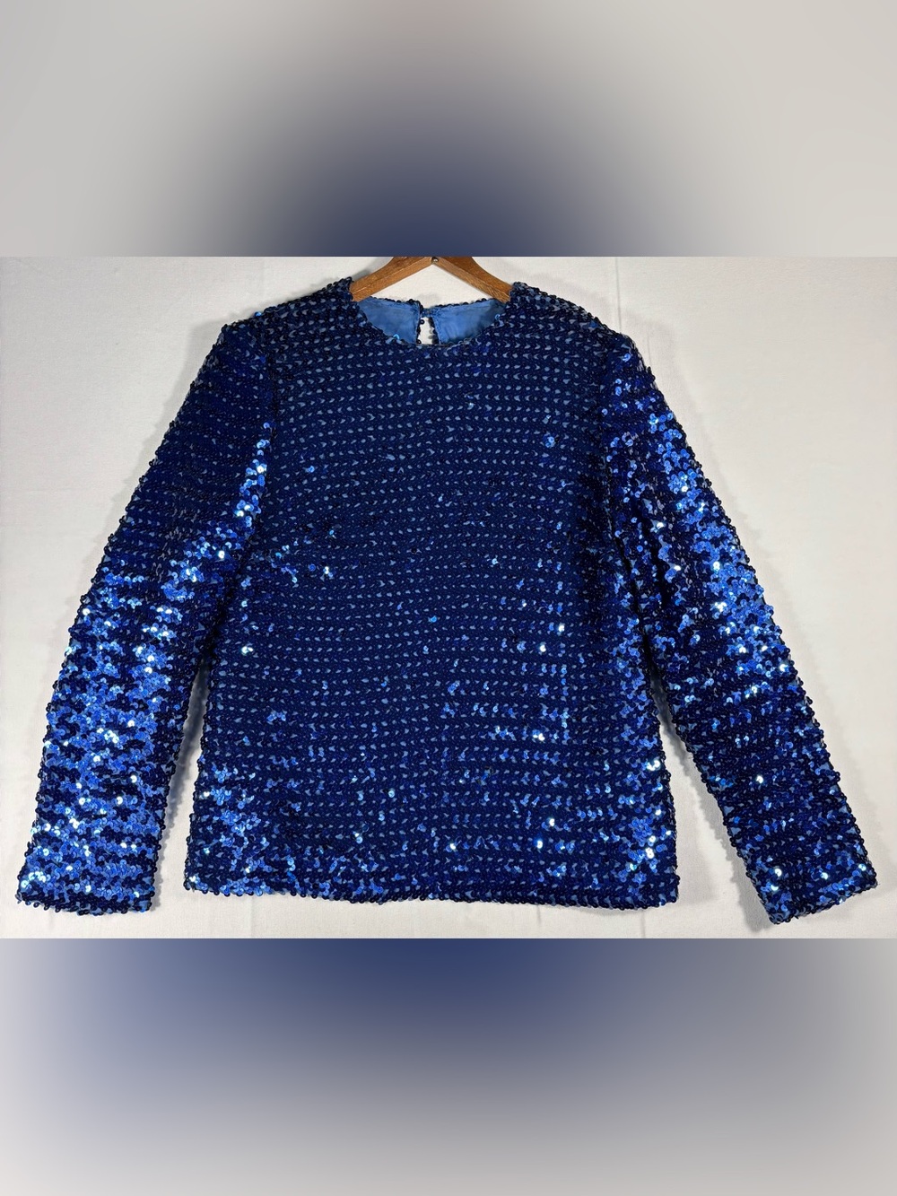 Women’s 8 Blue Sequin Long-Sleeve Top with pit-to-pit measurement of 19”